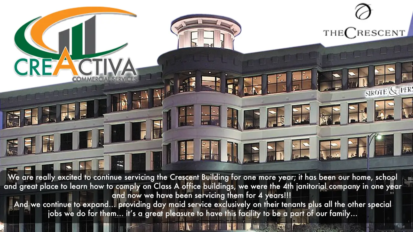A large building with many windows and a logo.